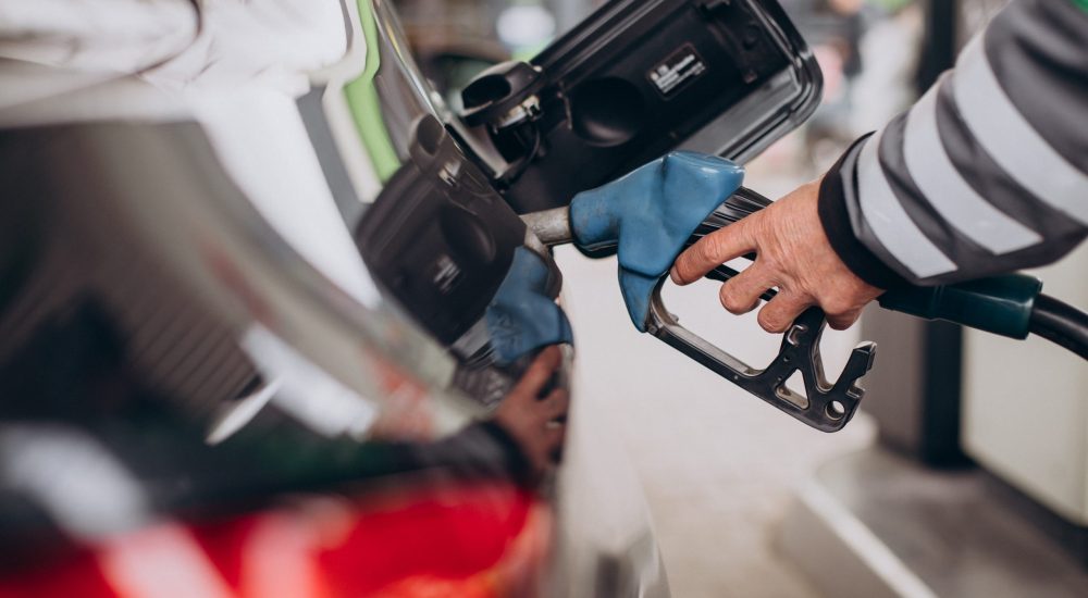 Car refueling at fuel station